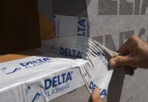 Covering the dart with one a piece of DELTA®-FLASHING 